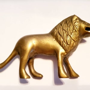 Solid brass standing lion figurine open mouthed curved tail 4.5&quot;L 2.75&quot;H weight 5 oz 145 gm vintage collectible home decor