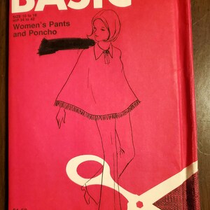 May include: A red sewing pattern booklet with a white illustration of a woman wearing pants and a poncho. The title of the pattern is "BASIC knits" and the text "Women's Pants and Poncho" is printed in black. The price is $1.50.