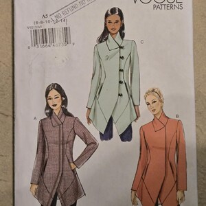 May include: Vogue Patterns sewing pattern for women's jackets. The pattern features three jacket designs in various colors, including a light green, a reddish-orange, and a patterned brown. The pattern size is A5 (6-8-10-12-14).