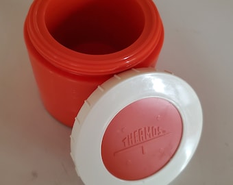 Vintage Thermos Products Ltd insulated jar model #1155 made in Canada orange body & white/orange screw on lid 3.25"H 3.75"W oz capacity