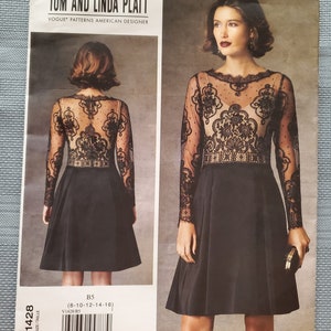 May include: A black and white sewing pattern for a dress with a lace overlay. The pattern is for sizes 8-10-12-14-16. The pattern is by Tom and Linda Platt, Vogue Patterns American Designer.