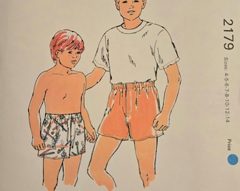 Kwik Sew #2179 boys boxer shorts uncut sewing pattern lightweight woven fabric, stitched elastic waist, no side seams, front fly sz 4-14
