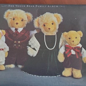 May include: A sewing pattern for four teddy bears, featuring a family of bears dressed in formal attire. The pattern is titled "The Vogue Bear Family Album" and is from Vogue Crafts.