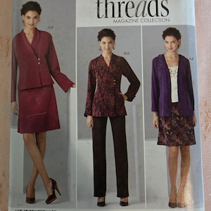 May include: Simplicity sewing pattern 2288 showing three women's fashion designs. The pattern includes a skirt suit, a trouser suit, and a skirt and jacket ensemble. The magazine collection cover has the text "threads" and "Step by step to sewing success!"