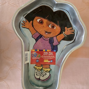 Wilton Enterprises 2105-6300 Viacom International Dora the Explorer full body aluminium cake baking pan made in China birthday parties, used