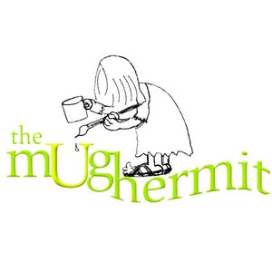 May include: A black and white illustration of a person painting the words "the mug hermit" in green. The person is wearing a long robe and sandals.