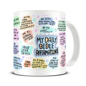 May include: White ceramic mug with a colourful design featuring bible verses and the text "My Daily Bible Affirmations".