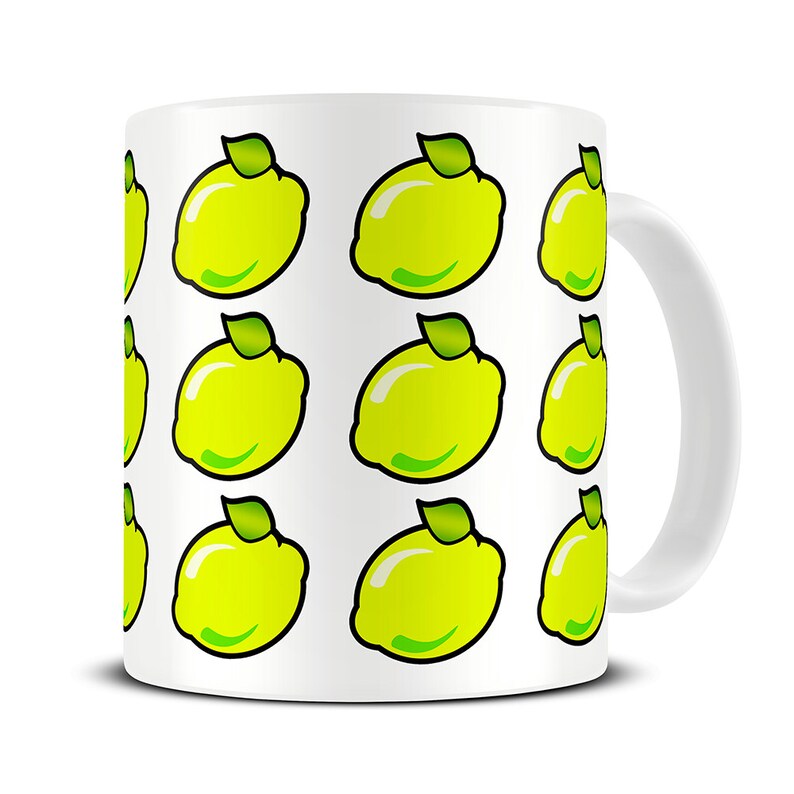 May include: White ceramic mug with a repeating pattern of yellow lemons with green leaves.