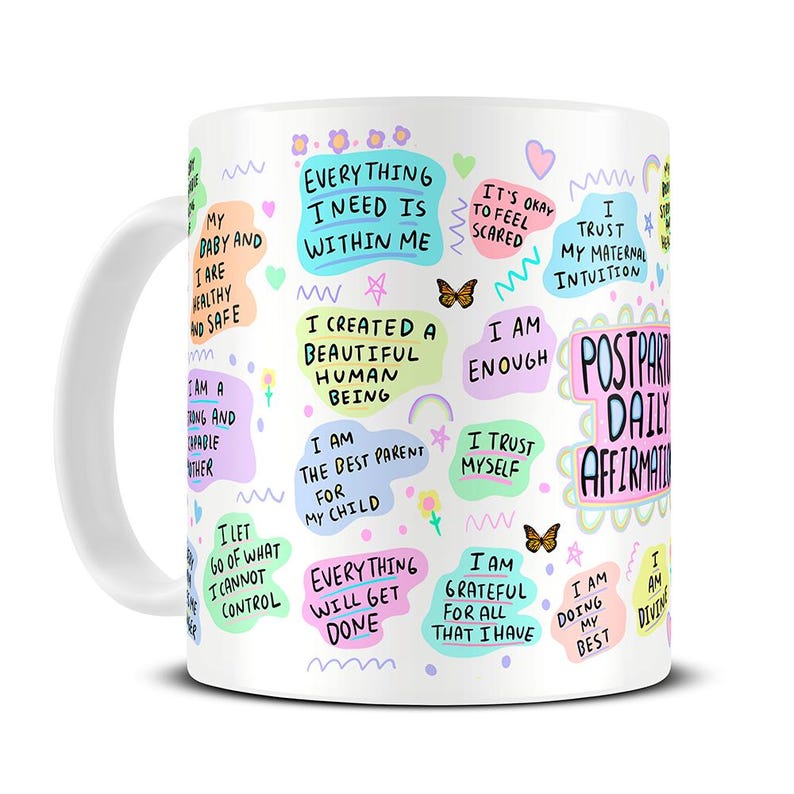 May include: White ceramic mug with colorful text and illustrations. The text includes affirmations such as "I am enough", "I trust myself", and "Everything I need is within me".