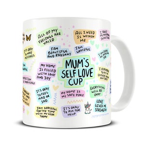 May include: White ceramic mug with a colourful design featuring positive affirmations for mums. The mug has a unicorn, butterfly, and heart graphics. The text on the mug includes phrases like "All of my feelings are valid", "It's okay to make mistakes", "My home is filled with love and joy", "Mum's Self Love Cup", "Everything will be okay", and "Love gives me strength".