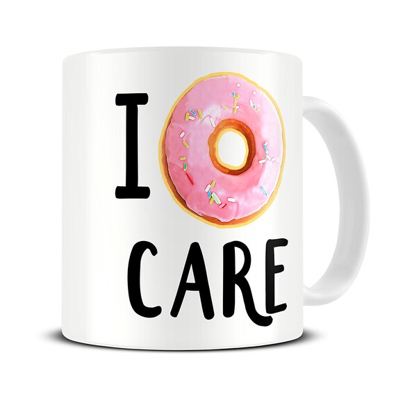 Pink donut and coffee cup. Pink donut and coffee cup.