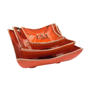 Mid-Century Modern Keramik Aschenbecher Set: 3 California Art Pottery Nesting Aschenbecher, Orange und Gold Glasur