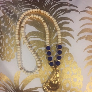 Gold oyster shell necklace with blue sea glass beads inspired FREE SHIPPING!