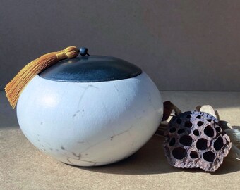 Naked Raku ceramic box with a timelessly chic feel. This silky-smooth box will add a touch of elegance to your home