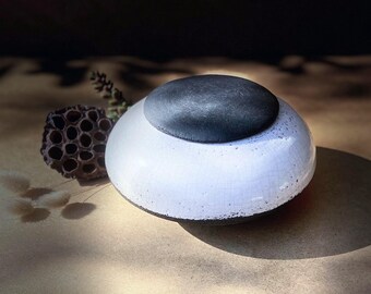 Raku ceramic box. This beautiful decorative object with its elongated curves is perfect for holding your jewelry and other small treasures