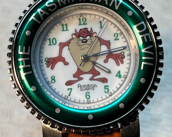 Reloj de pulsera vintage Taz Tazmanian Devil de Armitron para hombre con bisel verde brillante.