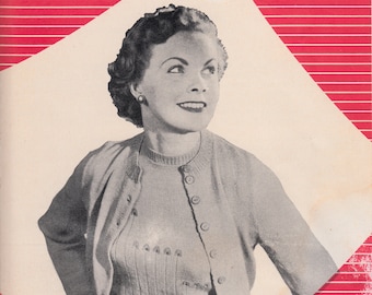 May include: A vintage knitting pattern featuring a woman wearing a two-piece sweater set. The pattern is titled "Original Patterns by Strick-Malador" and "Women's Classic Twin Sweater Set". The price is 10 pence.