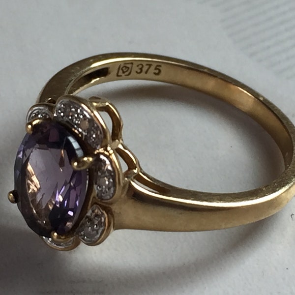 This is a beautiful quality vintage 9ct yellow gold amethyst and diamond ring (new old stock)