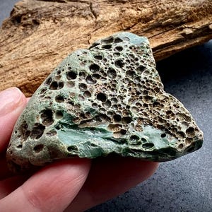Extra rare spongy sea lava stone One of kind porous slag stone AOK coast find for real collectors Unusual ocean pebble Unique beach treasure