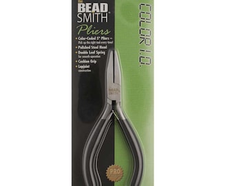 May include: Black and green 5-inch flat nose pliers with a color-coded handle. The pliers are made of polished steel and have a double leaf spring for smooth operation. The pliers also feature a cushion grip and lapjoint construction. The packaging says "The Bead Smith Pliers" and "Color 1.0."