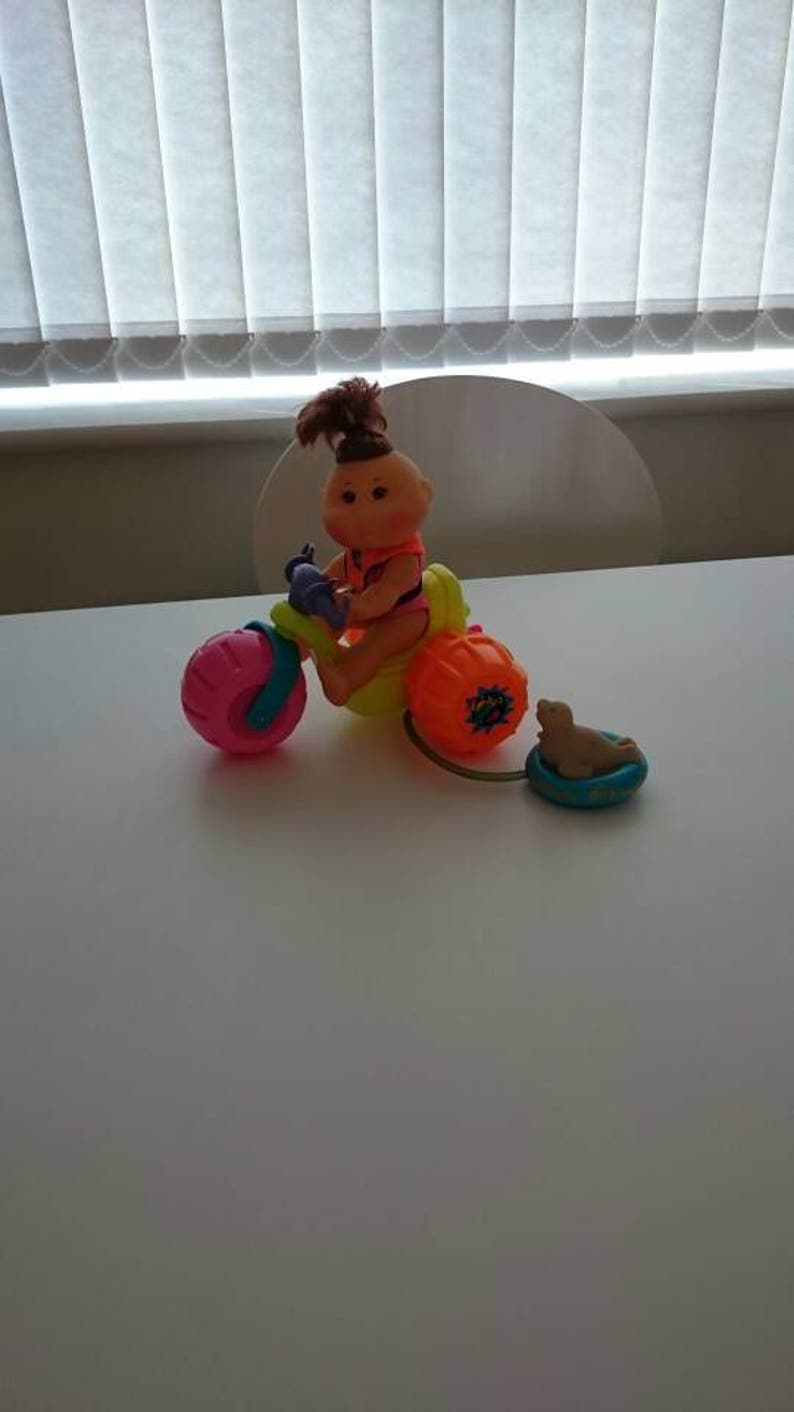 Rare pool bath Cabbage patch kids doll and water buggy car bike Very good condition bath wind up and go seals a squirter Collectable doll
