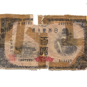 Japan WWII China 100 Yen Bank Note (rough)