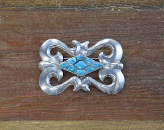 Southwest Sterling Silver Cast Pin with Turquoise Inlay Center*
