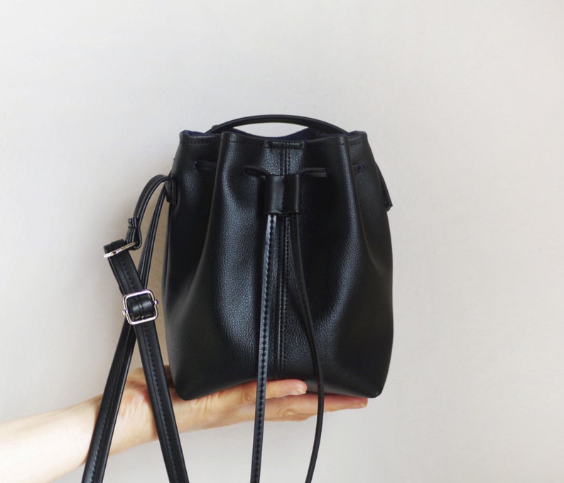 Tiny black vegan leather bucket bag 