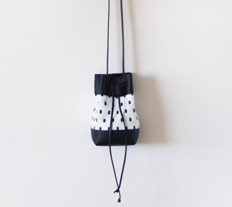 Mini vegan bucket bag with screen printed canvas and black leather image 3