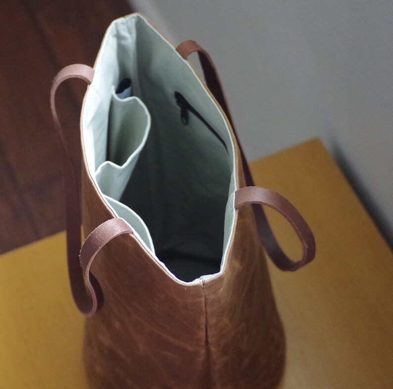 Waxed canvas tote bag with leather handles and round bottom image 3