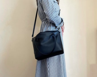 Black leather crossbody tote bag