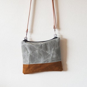 New waxed canvas crossbody bag with zipper and vegetable tanned leather strap