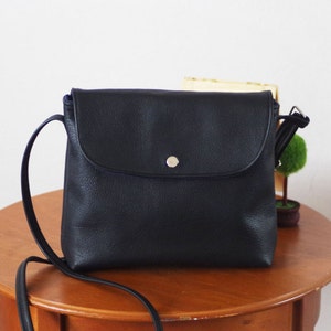 Black small black leather crossbody bag with flap image 1