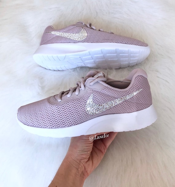 Swarovski Nike Tanjun Particle Pink/White customized with SWAROVSKI® Xirius Rose-Cut Crystals. Swarovski Nike Tanjun Particle Pink/White customized with SWAROVSKI® Xirius Rose-Cut Crystals.
