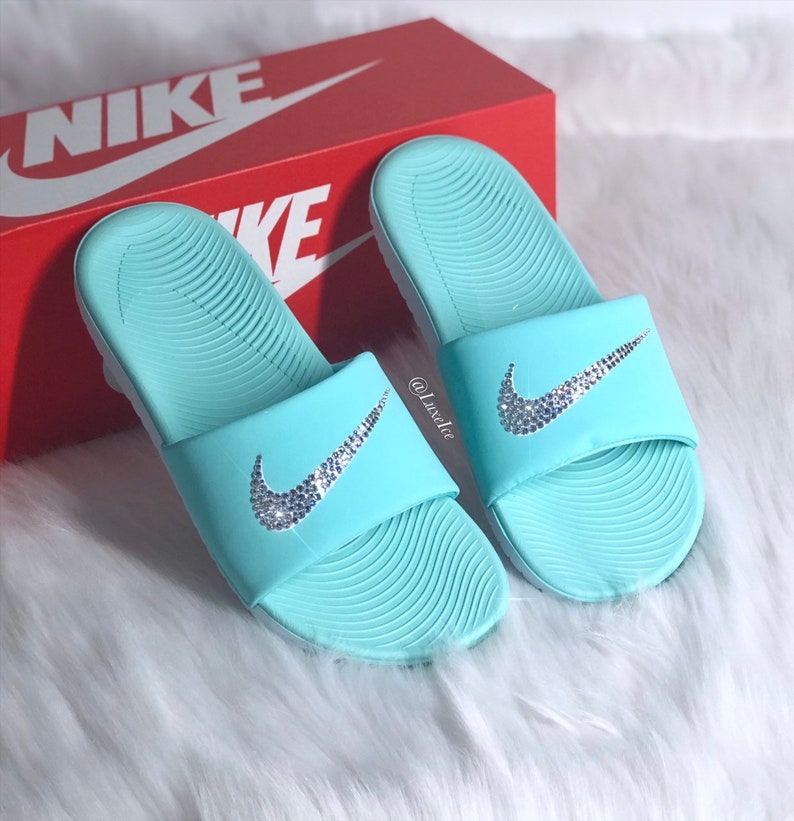 mint green nike slides