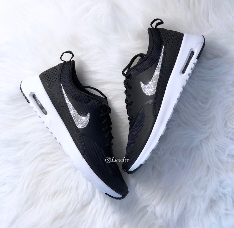 Ships Today!!! Swarovski Nike Air Max Thea BlackSummit WhiteWolf made with Swarovski Crystals. Size 6 Ships Today!!! Swarovski Nike Air Max Thea BlackSummit WhiteWolf made with Swarovski Crystals. Size 6