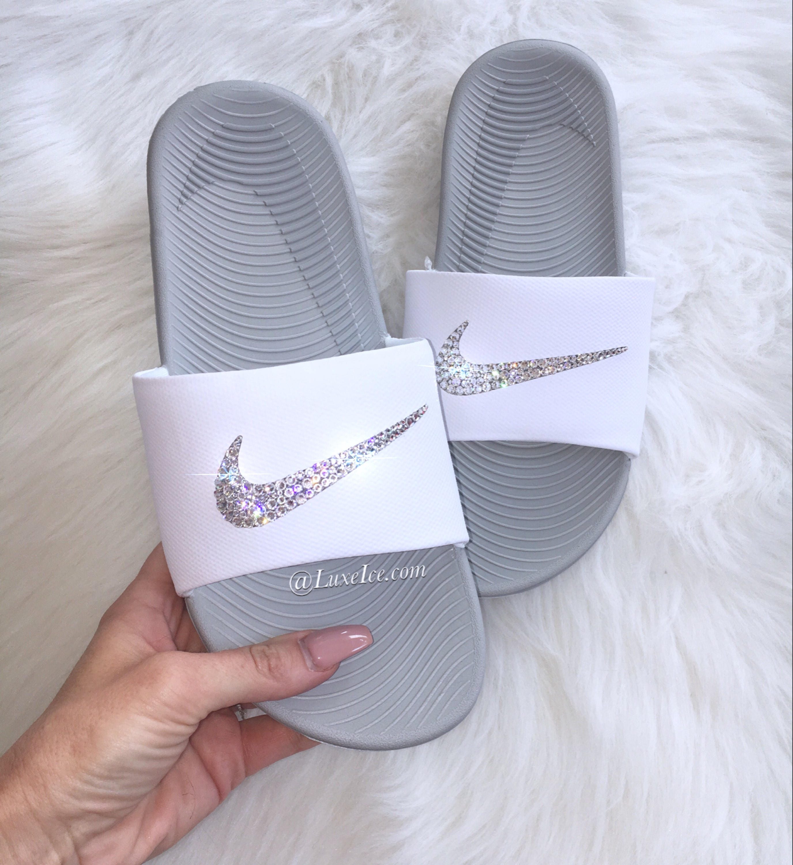 purple and gold nike slides