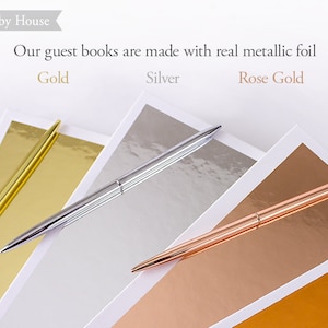 May include: Three pens on a white surface, each pen is on a different colored paper. The papers are gold, silver, and rose gold. The text "Our guest books are made with real metallic foil" is above the pens. The text "Gold", "Silver", and "Rose Gold" are below the pens.