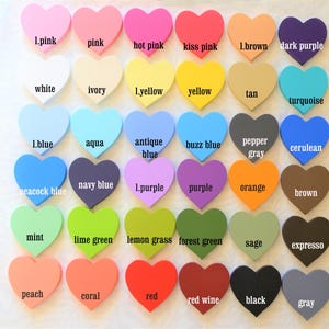 May include: A chart of 36 heart-shaped color swatches with the names of each color written below. The colors include pink, white, blue, green, yellow, orange, red, brown, gray, purple, and turquoise.