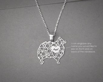 May include: Silver necklace with a geometric dog pendant. The pendant has a heart-shaped cutout with the word "Angel" engraved inside. The necklace can be personalized with any name on the front and back.