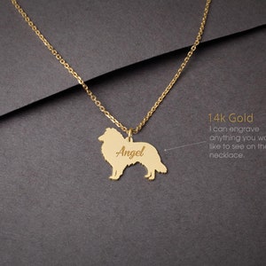 May include: A gold necklace with a pendant shaped like a Collie dog. The pendant is engraved with the name "Angel". The necklace is made of 14k gold and can be engraved with any text.