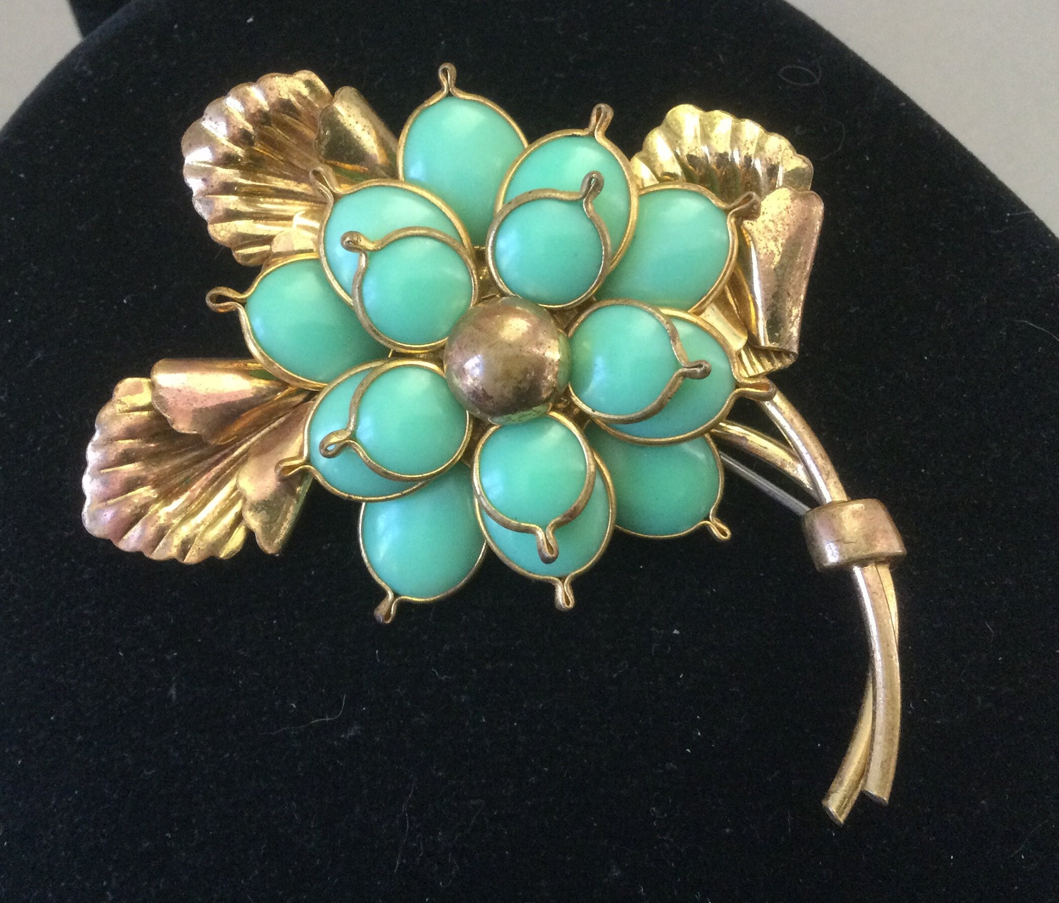 lv gold brooch