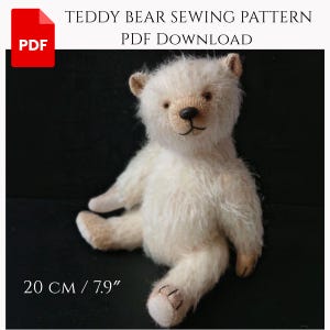 May include: A white teddy bear with a fuzzy texture, dark eyes, and a black nose. The text reads TEDDY BEAR SEWING PATTERN PDF DOWNLOAD and 20 cm / 7.9 inches. The bear has light tan accents on the ears and paws and sits in a seated position.