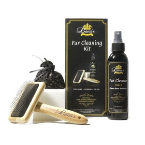 May include: A fur cleaning kit with a black and gold label that says "Lana's Fur Cleaning Kit". The kit includes a fur brush, a fur pad, a bottle of fur cleaner, and a black mesh bag.