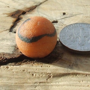 beautiful sea marble, solid, milk glass, orange color with coffee marks, well frosted, for collectors, 148