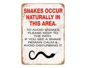 Snakes Occur Naturally in This Area Vintage Look Metal Sign