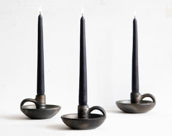 Handmade clay candleholder with handle for tapered candle sticks in black metallic finish Scandinavian design minimalist interior decor