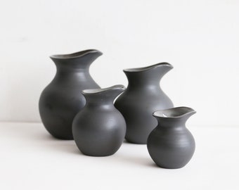 Set of 4 pitchers jugs and creamers | matte black pottery kitchen containers