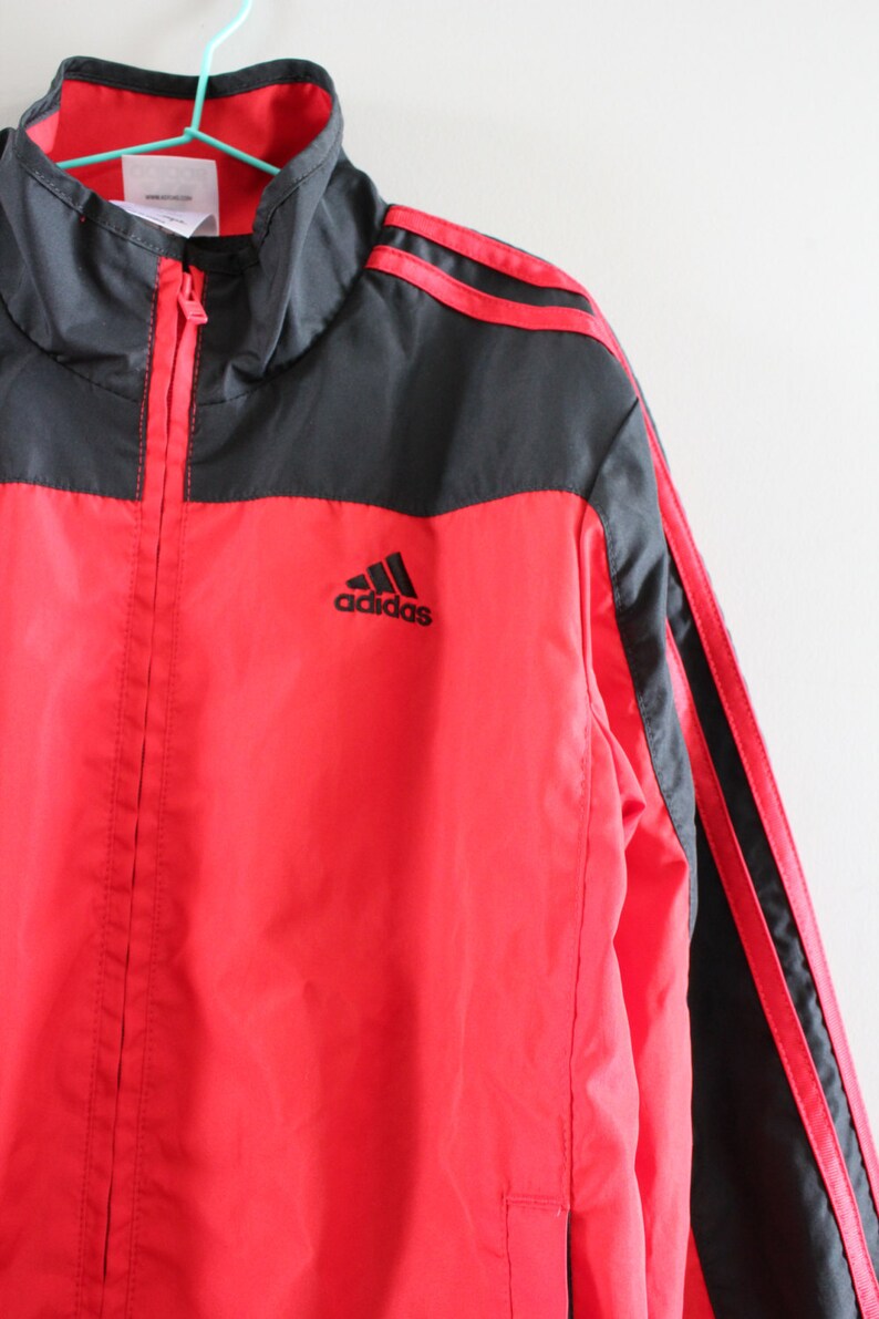 red stripe adidas jacket