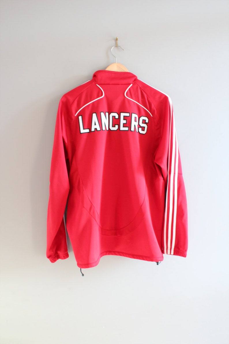 Jahrgang Kinder Adidas Track Jacke Adidas Windbreaker grau schwarz 3 Streifen Reißverschluss Kapuze Trainingsanzug Jacke Reißverschluss Jumper Größe Jahrgang Kinder Adidas Track Jacke Adidas Windbreaker grau schwarz 3 Streifen Reißverschluss Kapuze Trainingsanzug Jacke Reißverschluss Jumper Größe
